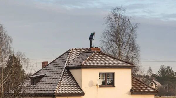 Clean chimney and happy homeowner